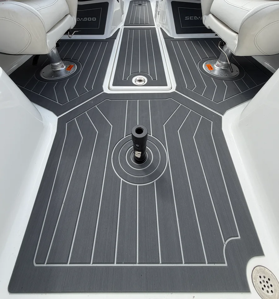 Close detail of the grey deck grooves and fitted hatch edges on a completed Sea-Doo